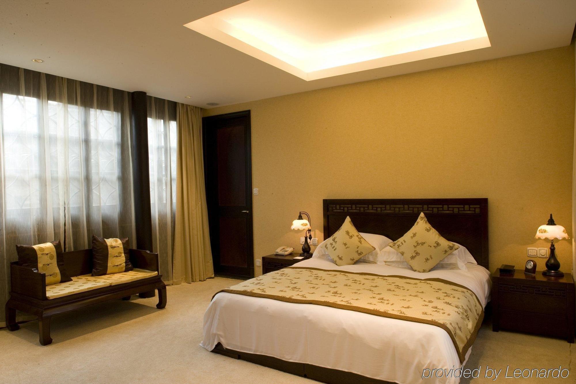 Wuzhen Clubhouse Hotell Jiaxing Rom bilde