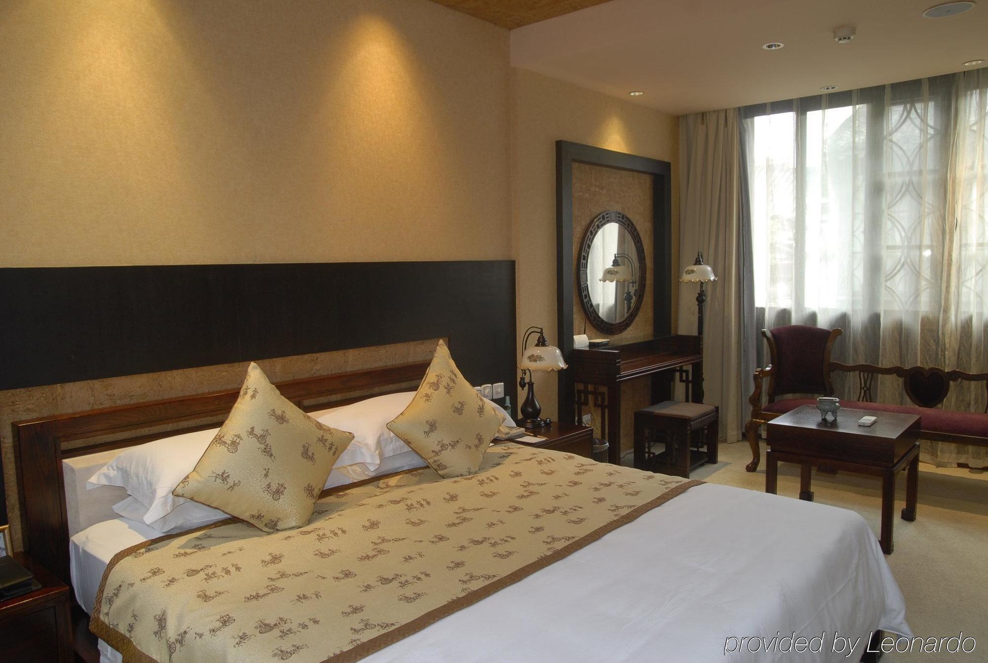 Wuzhen Clubhouse Hotell Jiaxing Rom bilde