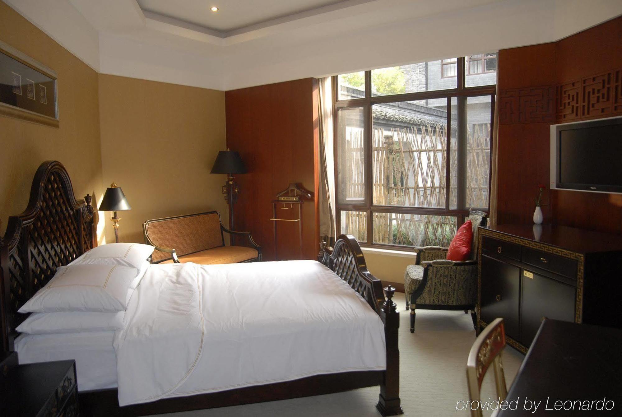 Wuzhen Clubhouse Hotell Jiaxing Rom bilde